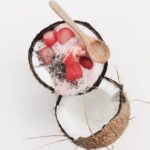 coconut filled with slice of fruits